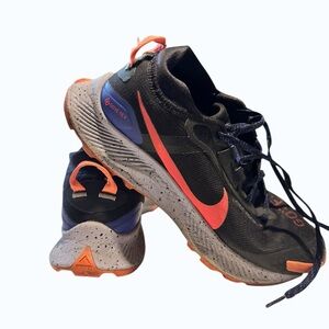 Nike Black Running Shoes with Pink Swoosh and Purple Lace Details